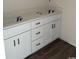 Bathroom vanity with white shaker cabinets, dark hardware, and white countertop at 1395 Knotty Branch Rd., Conway, SC 29527