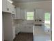 Bright kitchen with shaker cabinets, white countertop, and an island at 1395 Knotty Branch Rd., Conway, SC 29527
