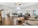 Open-concept living room with hardwood floors and view into the kitchen at 1478 Suncrest Dr., Myrtle Beach, SC 29577