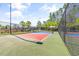 A well-maintained pickleball court with net, fencing, and lighting for fun and games in the community at 1478 Suncrest Dr., Myrtle Beach, SC 29577