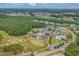 Aerial view showcasing community amenities including golf course, pools, and clubhouse at 152 Shenandoah Dr., Murrells Inlet, SC 29576