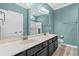 Bathroom with double sink vanity, tile floors and a large mirror at 152 Shenandoah Dr., Murrells Inlet, SC 29576
