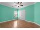 Bedroom with hardwood floors, a ceiling fan and double door closet at 152 Shenandoah Dr., Murrells Inlet, SC 29576