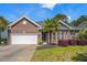 Charming brick home with a two-car garage, well-manicured lawn, and tasteful landscaping at 152 Shenandoah Dr., Murrells Inlet, SC 29576