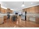 Open kitchen with stainless steel appliances, a center island, and hardwood floors at 152 Shenandoah Dr., Murrells Inlet, SC 29576