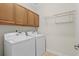 Laundry room with washer, dryer and storage cabinets at 152 Shenandoah Dr., Murrells Inlet, SC 29576
