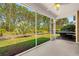 Screened-in patio with view of backyard and wooded area at 152 Shenandoah Dr., Murrells Inlet, SC 29576