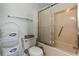 Functional bathroom with shower-tub combo, toilet and storage basket at 1581 S Waccamaw Dr. # 303, Murrells Inlet, SC 29576