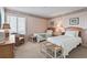 Inviting bedroom with twin beds, warm lighting, and tasteful decor at 1581 S Waccamaw Dr. # 303, Murrells Inlet, SC 29576