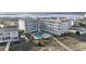 Coastal condo complex boasts balconies, a shared pool, and beach access with stunning ocean views at 1581 S Waccamaw Dr. # 303, Murrells Inlet, SC 29576