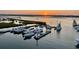 Picturesque marina view at sunset with boats docked in the calm water at 1581 S Waccamaw Dr. # 303, Murrells Inlet, SC 29576
