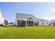 Charming home featuring a spacious backyard and screened-in porch, perfect for outdoor living at 2105 Ballast Ct., Myrtle Beach, SC 29579