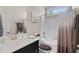 Bathroom featuring a black vanity and shower with a new shower curtain and hardware at 2105 Ballast Ct., Myrtle Beach, SC 29579