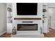 Cozy fireplace with built-in shelving, perfect for displaying decor and providing warmth at 2105 Ballast Ct., Myrtle Beach, SC 29579
