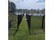 Fenced backyard with garden and path leading to pond at 320 Mckaylas Ct., Myrtle Beach, SC 29579