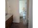 Neat bathroom area showing a toilet, sink, and shower with tiled floors and neutral color scheme at 320 Mckaylas Ct., Myrtle Beach, SC 29579