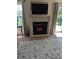 Comfortable living room featuring fireplace and elegant rug at 320 Mckaylas Ct., Myrtle Beach, SC 29579
