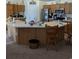Spacious kitchen with light wood cabinets, a central island with seating, and stainless steel appliances at 320 Mckaylas Ct., Myrtle Beach, SC 29579