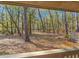A view of the property's backyard featuring mature trees and shrubs offering privacy at 400 Melrose Pl. # 14-A, Myrtle Beach, SC 29572