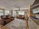 Cozy living room featuring comfortable seating, a fireplace, and a view to the outside at 400 Melrose Pl. # 14-A, Myrtle Beach, SC 29572