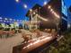 Stylish outdoor patio with cozy seating, a modern fire pit, and ambient string lights at Black Drum Brewing at 400 Melrose Pl. # 14-A, Myrtle Beach, SC 29572