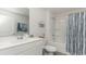 Clean, bright bathroom featuring tub/shower combo and modern vanity at 598 Strawberry Field Way, Galivants Ferry, SC 29544