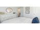 Light-filled bedroom with a dresser, matching wall art, and a ceiling fan at 598 Strawberry Field Way, Galivants Ferry, SC 29544