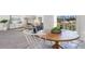 View of the dining area and adjoining living area with view to the backyard at 598 Strawberry Field Way, Galivants Ferry, SC 29544