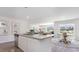 Open concept kitchen featuring granite countertops, island, and adjoining dining area at 598 Strawberry Field Way, Galivants Ferry, SC 29544