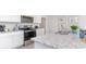 Close up of a large granite kitchen island with modern stainless steel oven at 598 Strawberry Field Way, Galivants Ferry, SC 29544