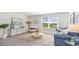 Bright living room featuring a large window and stylish decor at 598 Strawberry Field Way, Galivants Ferry, SC 29544