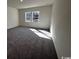 Bright bedroom with new carpet and lots of natural light at 623 Castillo Dr., Loris, SC 29569
