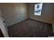 Inviting bedroom with soft carpeting and natural light from a window at 623 Castillo Dr., Loris, SC 29569