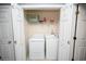 A laundry room is behind double doors and features a full washer and dryer at 100 Barnacle Ln. # S-4, Little River, SC 29566