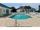 Community pool with sun loungers and well-maintained grounds at 100 Barnacle Ln. # S-4, Little River, SC 29566