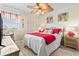 Bright bedroom featuring a large bed and beach-themed decor, creating a serene and inviting atmosphere at 1501 S Waccamaw Dr. # 3-L, Murrells Inlet, SC 29576