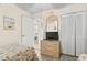 Bedroom with closet, dresser and TV at 1501 S Waccamaw Dr. # 3-L, Murrells Inlet, SC 29576