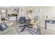 A cozy living area with an open kitchen and coastal decor at 1501 S Waccamaw Dr. # 3-L, Murrells Inlet, SC 29576