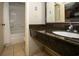 Well-lit bathroom featuring granite counters and updated sink fixtures at 1501 South Ocean Blvd. # 738, Myrtle Beach, SC 29577