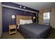 Inviting bedroom featuring a comfortable queen-size bed, stylish lamps, and a lovely outdoor view at 1501 South Ocean Blvd. # 738, Myrtle Beach, SC 29577