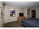 Well-lit bedroom featuring a comfortable queen-size bed, dresser, and large flat screen television at 1501 South Ocean Blvd. # 738, Myrtle Beach, SC 29577