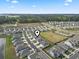 Aerial view of the community with the subject home marked by a location pin at 1612 Cosmos Lane, Myrtle Beach, SC 29577