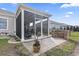 View of patio and brick built-in grill in fenced backyard at 1612 Cosmos Lane, Myrtle Beach, SC 29577