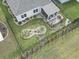 Aerial view of a backyard featuring a screened porch and landscaped garden area at 1612 Cosmos Lane, Myrtle Beach, SC 29577