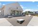 Modern clubhouse with a patio area set up for outdoor games like cornhole at 1612 Cosmos Lane, Myrtle Beach, SC 29577