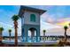 Striking entrance tower with palm trees and 'Meridian' sign against a colorful sky at 1612 Cosmos Lane, Myrtle Beach, SC 29577