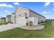 Home exterior featuring an attached garage, tasteful landscaping, and a neatly paved driveway at 1612 Cosmos Lane, Myrtle Beach, SC 29577