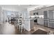 Modern kitchen with granite countertops, stainless steel appliances, and ample dining space at 1612 Cosmos Lane, Myrtle Beach, SC 29577