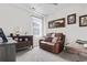 Cozy living room featuring neutral tones, modern decor, comfortable seating, and natural light at 1612 Cosmos Lane, Myrtle Beach, SC 29577