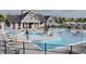 Large community pool with plenty of lounge chairs and umbrellas available for residents at 231 Broughton Dr., Myrtle Beach, SC 29579